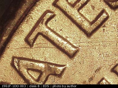 Die-stage A marker on 1961P•1DO•003 (1961 Doubled Die Obverse).