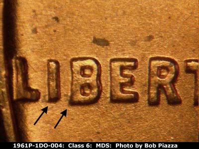 Die-stage B marker on 1961P•1DO•004 (1961 Doubled Die Obverse).