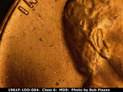Die-stage B marker on 1961P•1DO•004 (1961 Doubled Die Obverse).