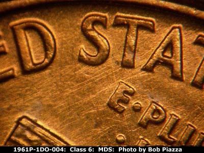 Die-stage B marker on 1961P•1DO•004 (1961 Doubled Die Obverse).