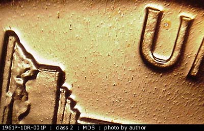 Die-stage B marker on 1961P•1DR•001P (1961 Doubled Die Reverse).