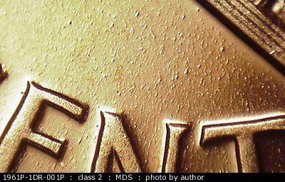 Die-stage B marker on 1961P•1DR•001P (1961 Doubled Die Reverse).