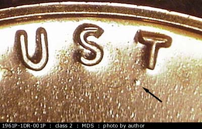 Die-stage B marker on 1961P•1DR•001P (1961 Doubled Die Reverse).