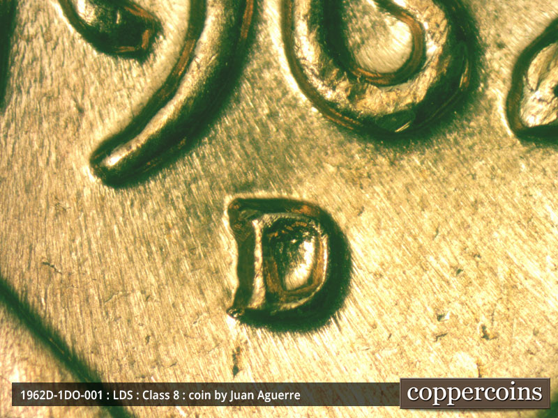 Die-stage C marker on 1962D•1DO•001 (1962 Doubled Die Obverse).