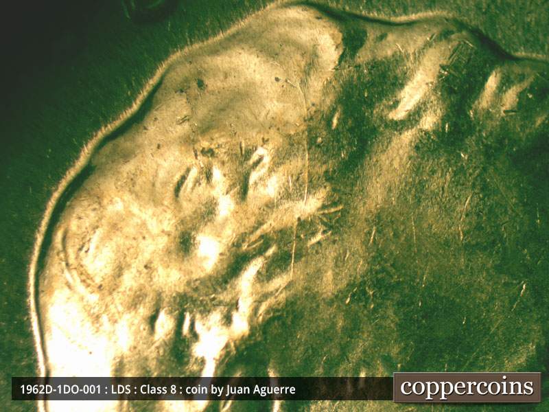 Die-stage C marker on 1962D•1DO•001 (1962 Doubled Die Obverse).