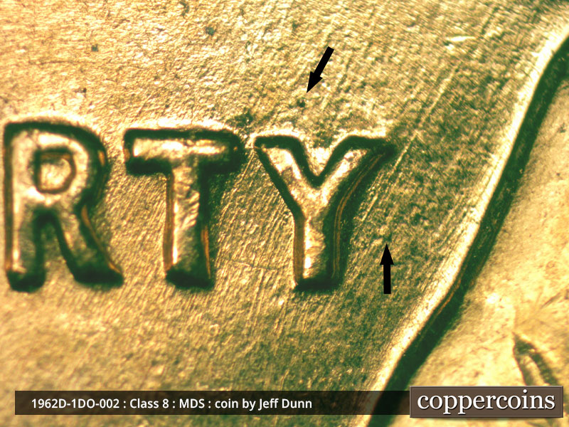Die-stage B marker on 1962D•1DO•002 (1962 Doubled Die Obverse).