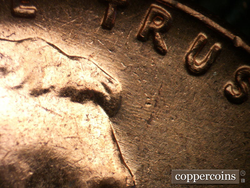 Die-stage B marker on 1962D•1DO•005 (1962 Doubled Die Obverse).