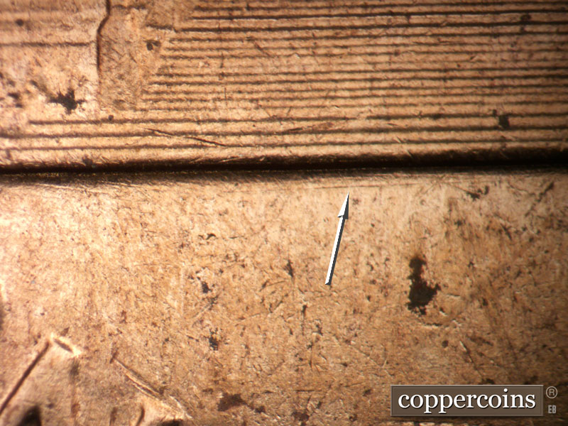 Die-stage B marker on 1962D•1DO•005 (1962 Doubled Die Obverse).
