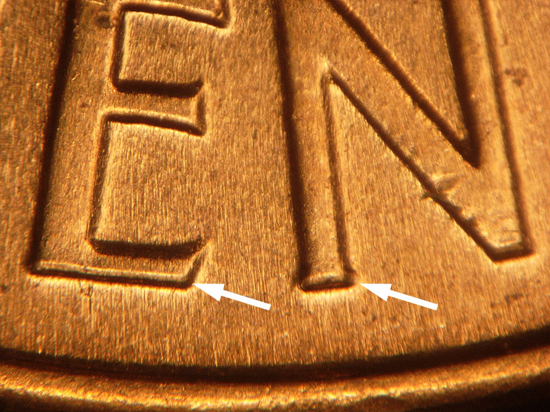 Die-stage B marker on 1962D•1DR•001 (1962 Doubled Die Reverse).