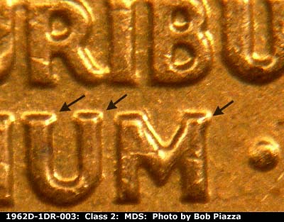 Die-stage B marker on 1962D•1DR•003 (1962 Doubled Die Reverse).