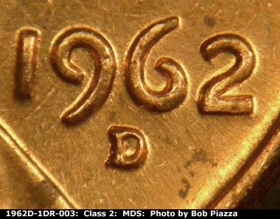 Die-stage B marker on 1962D•1DR•003 (1962 Doubled Die Reverse).