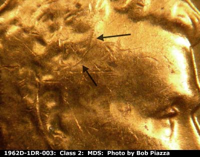 Die-stage B marker on 1962D•1DR•003 (1962 Doubled Die Reverse).