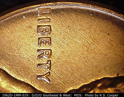 Die-stage B marker on 1962D•1MM•019 (1962 Repunched Mint Mark).