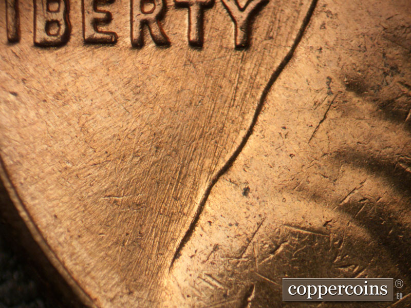 Die-stage B marker on 1962D•1MM•030 (1962 Repunched Mint Mark).