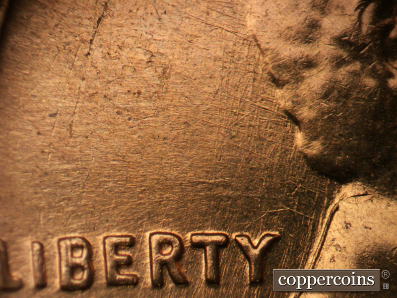 Die-stage B marker on 1962D•1MM•030 (1962 Repunched Mint Mark).