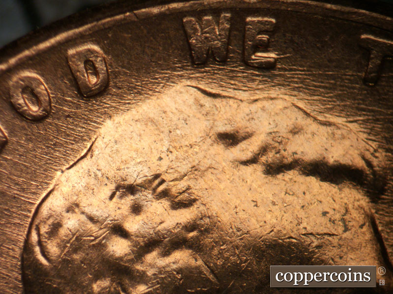 Die-stage B marker on 1962D•1MM•030 (1962 Repunched Mint Mark).
