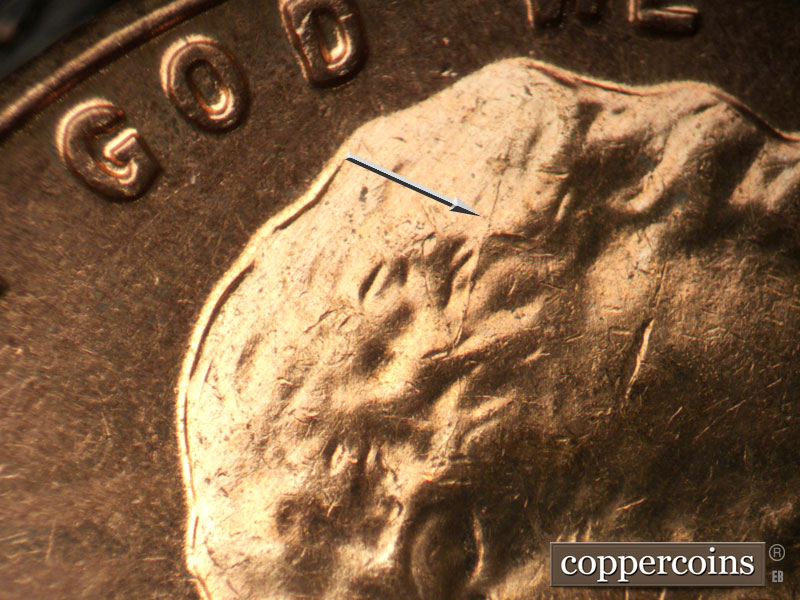 Die-stage B marker on 1962D•1MM•031 (1962 Repunched Mint Mark).