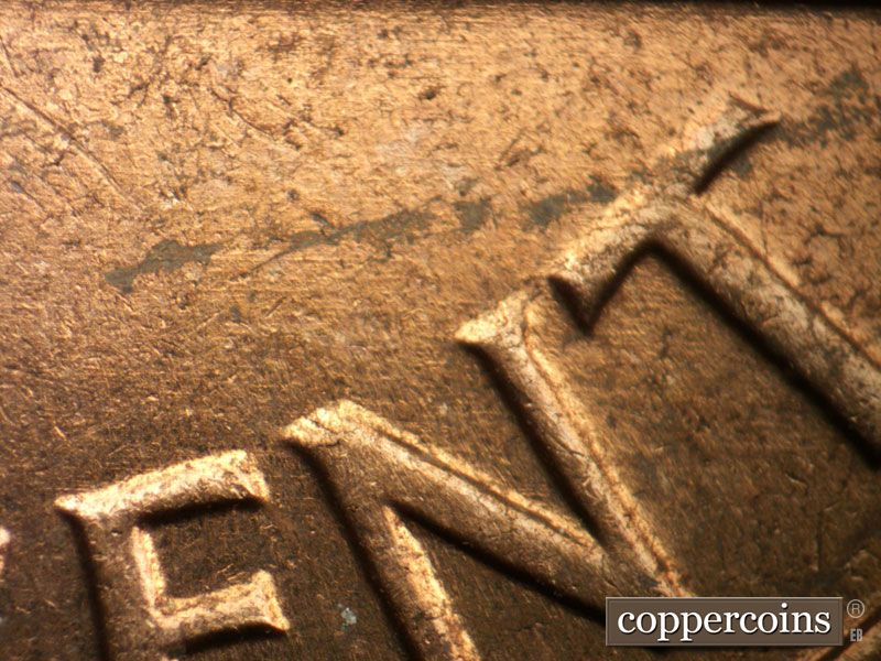 Die-stage B marker on 1962D•1MM•032 (1962 Repunched Mint Mark).