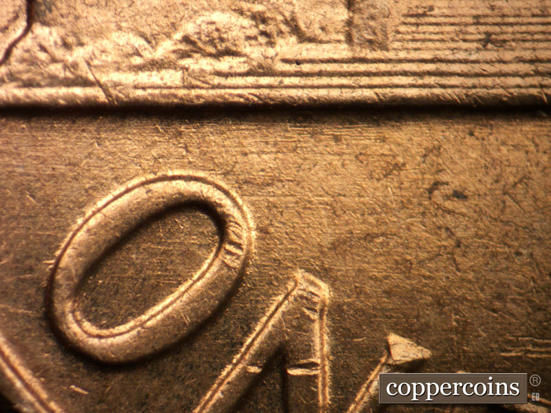 Die-stage B marker on 1962D•1MM•032 (1962 Repunched Mint Mark).