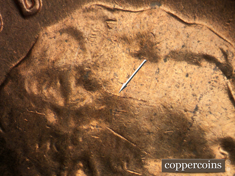 Die-stage B marker on 1962D•1MM•033 (1962 Repunched Mint Mark).