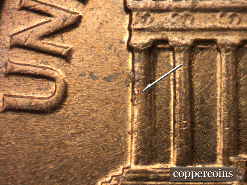 Die-stage B marker on 1962D•1MM•033 (1962 Repunched Mint Mark).