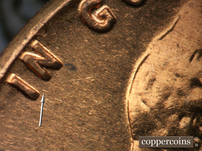 Die-stage B marker on 1962D•1MM•034 (1962 Repunched Mint Mark).