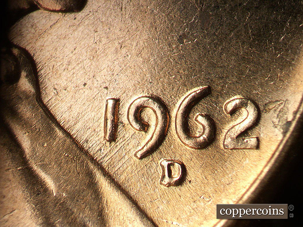 Die-stage B marker on 1962D•1MM•038 showing NE die scratches through 119 in date.