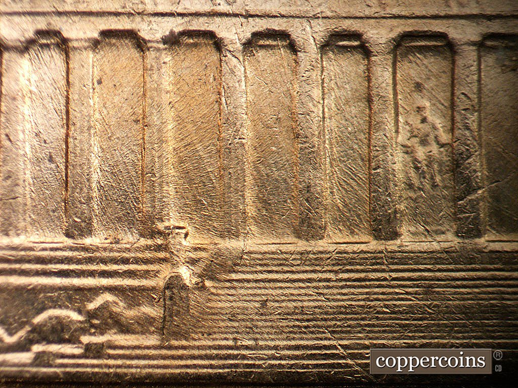 Die-stage B marker on 1962D•1MM•038 showing SSE die scratches in bays.