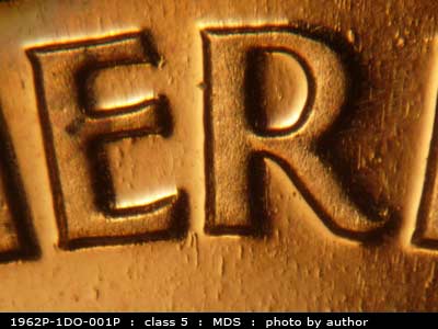 Die-stage B marker on 1962P•1DO•001P (1962 Doubled Die Obverse).