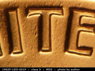 Die-stage B marker on 1962P•1DO•001P (1962 Doubled Die Obverse).