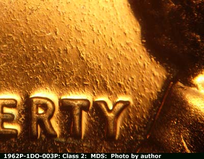 Die-stage B marker on 1962P•1DO•003P (1962 Doubled Die Obverse).