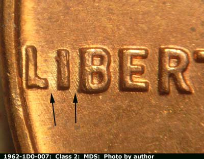 Die-stage B marker on 1962P•1DO•007 (1962 Doubled Die Obverse).