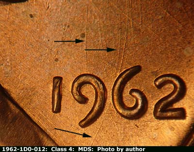 Die-stage B marker on 1962P•1DO•012 (1962 Doubled Die Obverse).