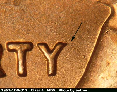 Die-stage B marker on 1962P•1DO•012 (1962 Doubled Die Obverse).