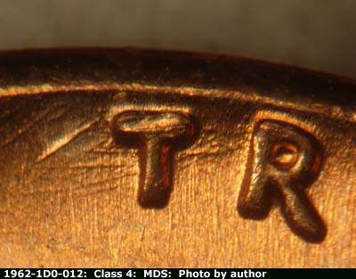 Die-stage B marker on 1962P•1DO•012 (1962 Doubled Die Obverse).