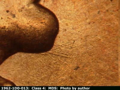 Die-stage B marker on 1962P•1DO•013 (1962 Doubled Die Obverse).