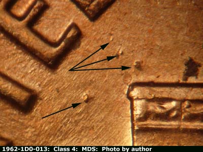 Die-stage B marker on 1962P•1DO•013 (1962 Doubled Die Obverse).