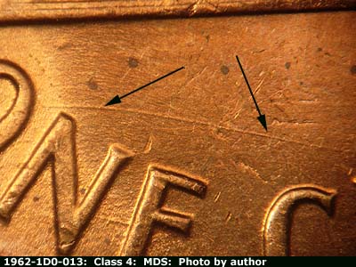Die-stage B marker on 1962P•1DO•013 (1962 Doubled Die Obverse).