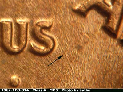 Die-stage B marker on 1962P•1DO•014 (1962 Doubled Die Obverse).