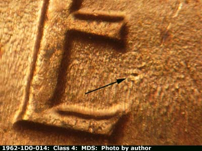 Die-stage B marker on 1962P•1DO•014 (1962 Doubled Die Obverse).
