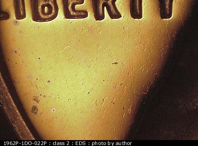 Die-stage A marker on 1962P•1DO•022P (1962 Doubled Die Obverse).
