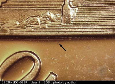 Die-stage A marker on 1962P•1DO•022P (1962 Doubled Die Obverse).