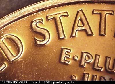 Die-stage A marker on 1962P•1DO•022P (1962 Doubled Die Obverse).