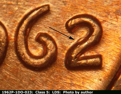 Die-stage C marker on 1962P•1DO•023 (1962 Doubled Die Obverse).