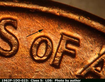 Die-stage C marker on 1962P•1DO•023 (1962 Doubled Die Obverse).