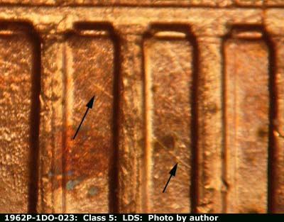 Die-stage C marker on 1962P•1DO•023 (1962 Doubled Die Obverse).