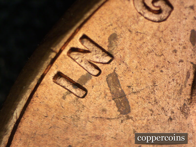 Die-stage A marker on 1962P•1DO•024 (1962 Doubled Die Obverse).