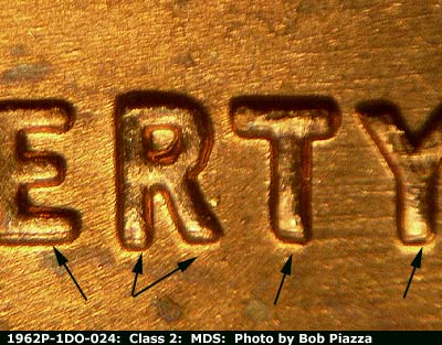 Die-stage B marker on 1962P•1DO•024 (1962 Doubled Die Obverse).