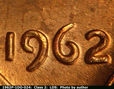 Die-stage C marker on 1962P•1DO•024 (1962 Doubled Die Obverse).