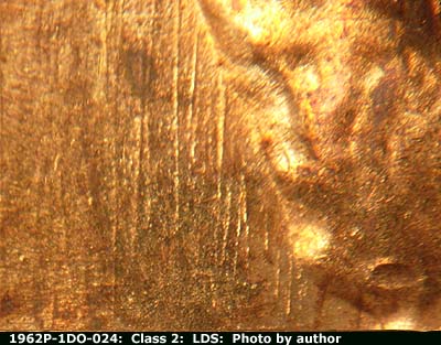 Die-stage C marker on 1962P•1DO•024 (1962 Doubled Die Obverse).